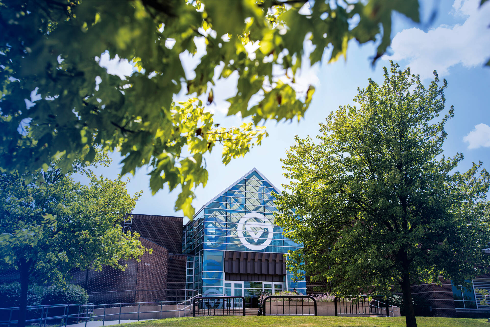 The doors to the Kirkhof Center on a sunny day